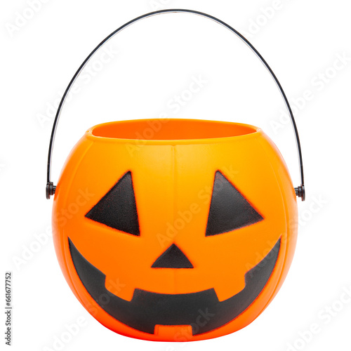 Halloween. Jack o lantern bucket for candy. Trick or treat on Halloween. Orange pumpkin scary smile face Jack-o-lantern. Happy Halloween. Hight resolution photo. White isolated background. 
