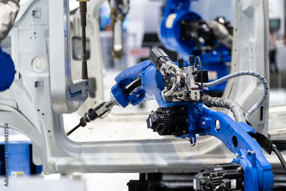 Fototapeta premium robot arm working in car factory