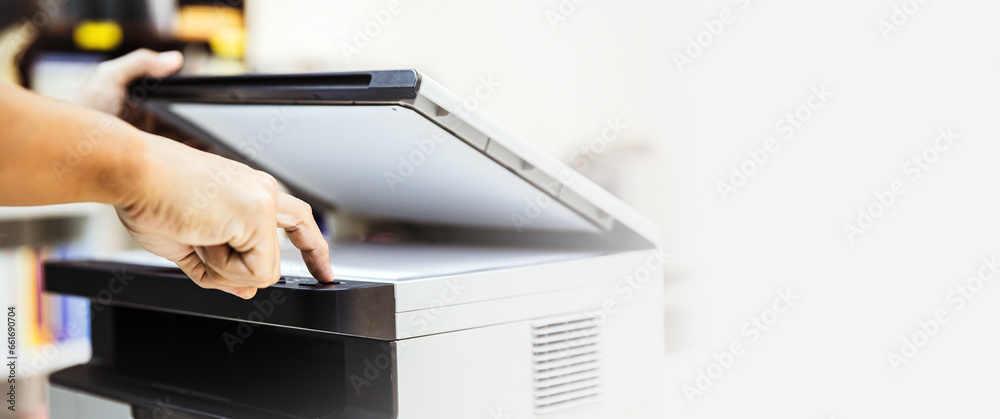 Hand use copier or photocopier or photocopy machine office equipment workplace for scanner or scanning document or printer for printing paperwork hard copy duplicate Xerox service maintenance repair. - obrazy, fototapety, plakaty 