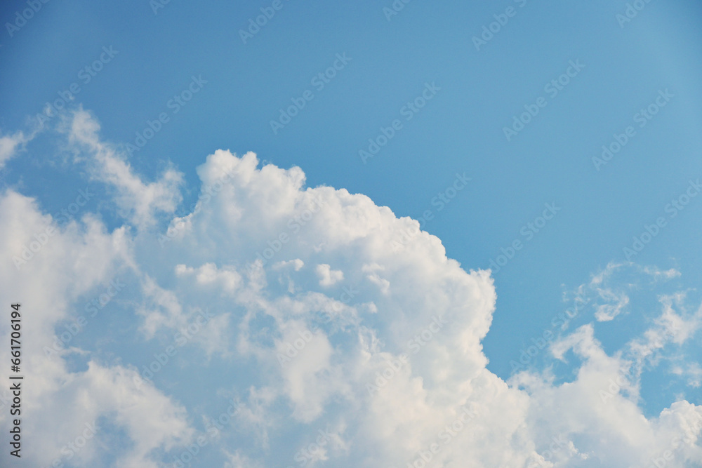 beautiful blue sky and white fluffy cloud with sunrise in the morning, natural background beautiful blue sky and white fluffy cloud with sunrise in the morning, natural background