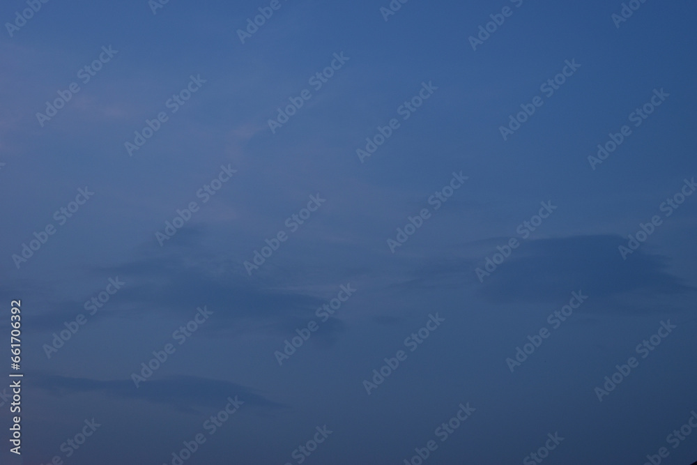beautiful blue sky and white fluffy cloud with in the evening, natural background