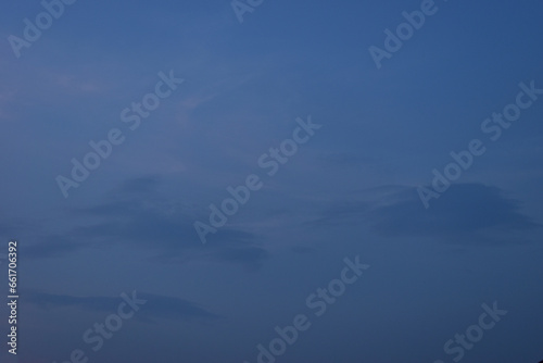 beautiful blue sky and white fluffy cloud with in the evening, natural background