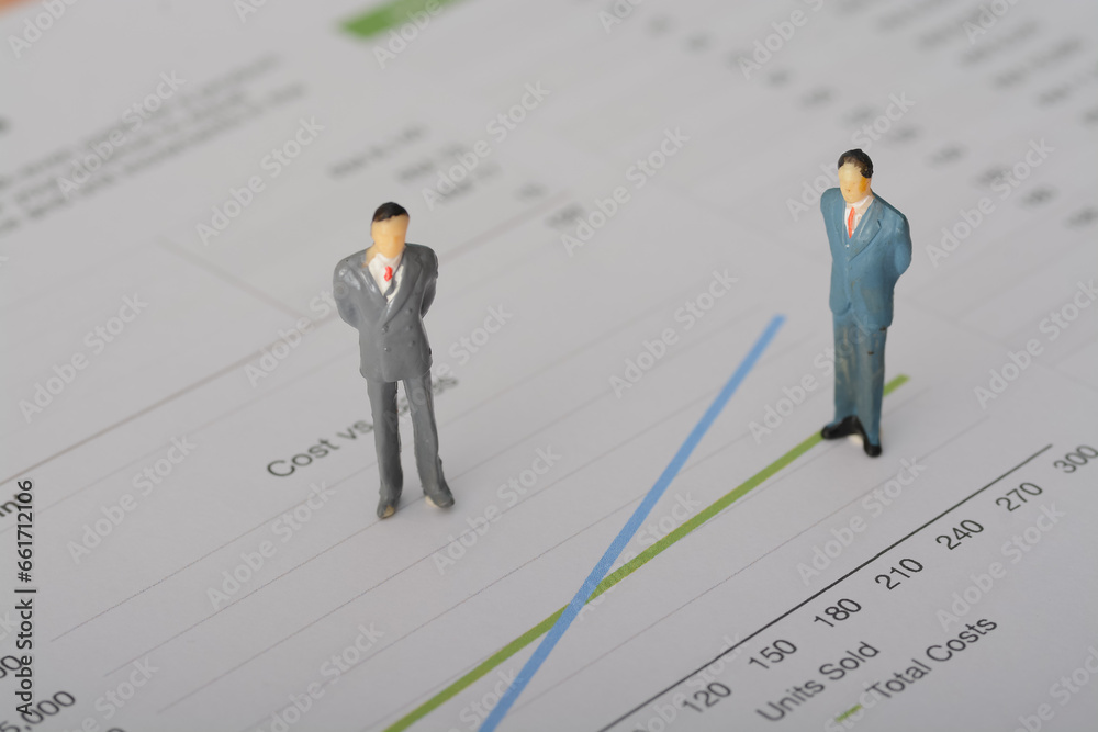 The businessman closely analyzed the sales graph to identify growth opportunities and make informed business decisions The businessman closely analyzed the sales graph to identify growth opportunities and make informed business decisions