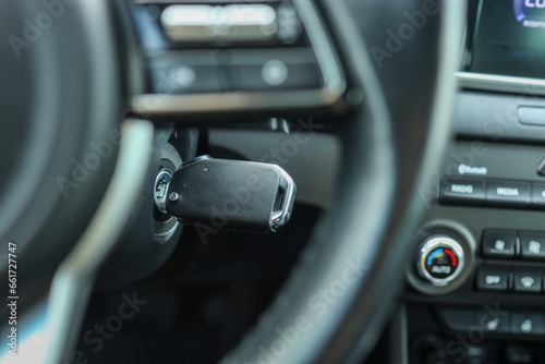 Ignition key of modern car close up. Car key in keyhole © shine.graphics