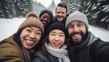 Selfie of multicultural friends in winter in the woods