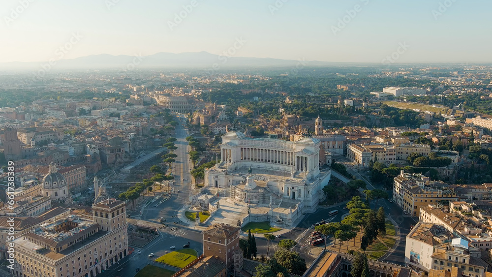 Rome, Italy. Vittoriano - Monument to the first king of Italy, Victor Emmanuel II. Flight over the city. Panorama of the city in the morning. Summer, Aerial View