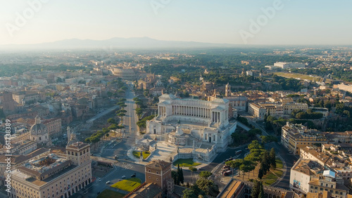 Rome, Italy. Vittoriano - Monument to the first king of Italy, Victor Emmanuel II. Flight over the city. Panorama of the city in the morning. Summer, Aerial View © nikitamaykov