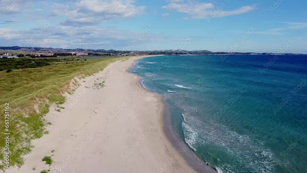Aerial view over the beach and transparent, arctic sea in Norway - Bird's-eye, drone shot Aerial view over the beach and transparent, arctic sea in Norway - Bird's-eye, drone shot