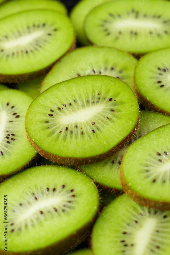 Fresh kiwi fruit slices texture background Fresh kiwi fruit slices texture background