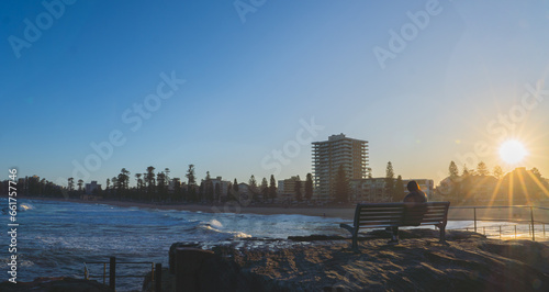 Manly Beach Sydney, Australia. Women looking at sunset