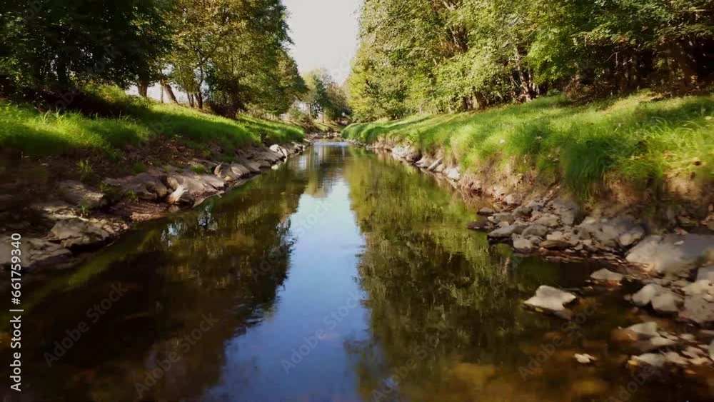 River with stones and trees byside River with stones and trees byside
