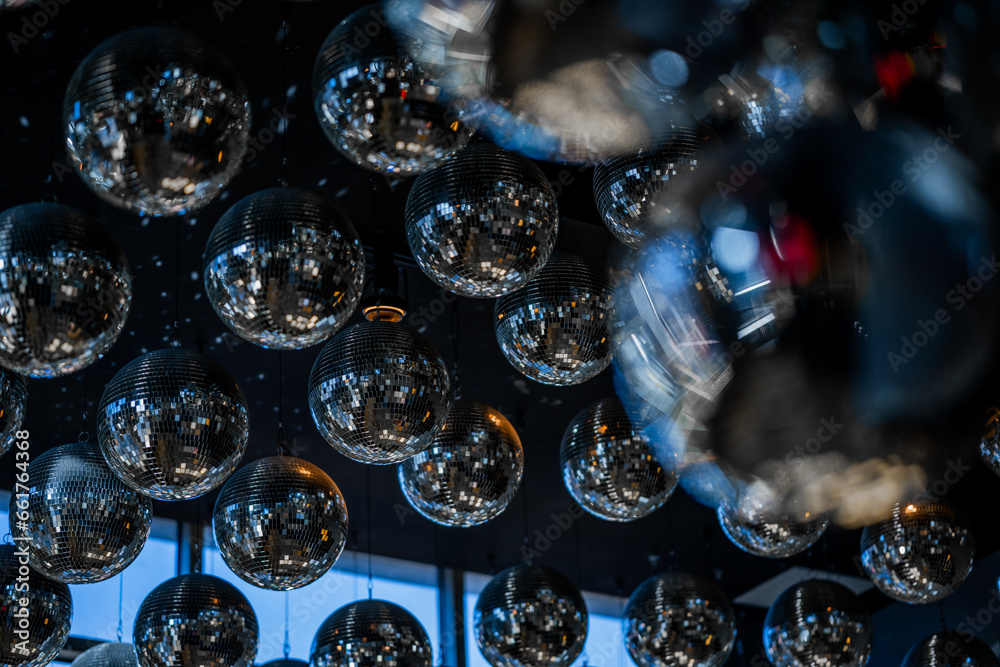 Disco ball decorations in a room, Decoration with mirrorballs Disco ball decorations in a room, Decoration with mirrorballs