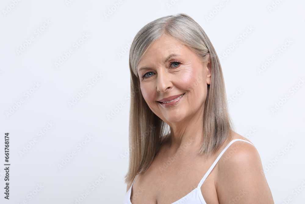 Portrait of beautiful senior woman on white background. Space for text Portrait of beautiful senior woman on white background. Space for text