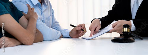 Obraz na plátně Loving couple seek legal consultation and assistance from law firm to discuss marriage law, proposal weddings and spousal support