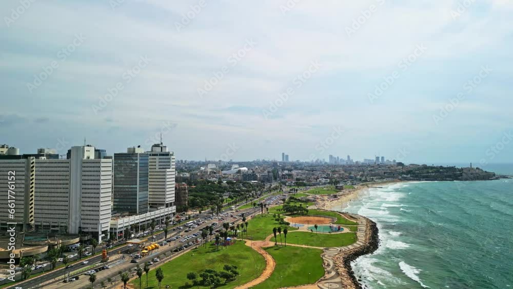 Tel Aviv, Israel, September 20, 2023. View from a drone of the Tel Aviv embankment, people swimming in the sea and playing sports. High quality 4k footage Tel Aviv, Israel, September 20, 2023. View from a drone of the Tel Aviv embankment, people swimming in the sea and playing sports. High quality 4k footage