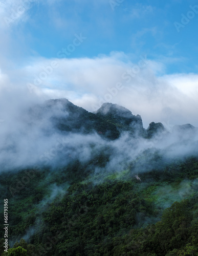 Doi Luang Chiang Dao mountain hills in Chiang Mai, Thailand. Nature landscape in travel trips and vacations. Doi Lhung Chiang Dao Viewpoint with mist and fog during rain season