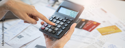 Fotografie stressed young asian woman trying to find money to pay credit card debt