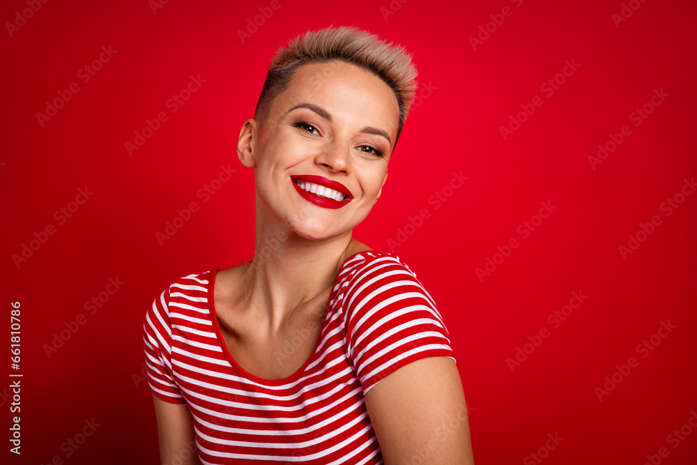Photo of positive pretty lovely girl dressed nice outfit white bright smile glamour makeup isolated on red color background