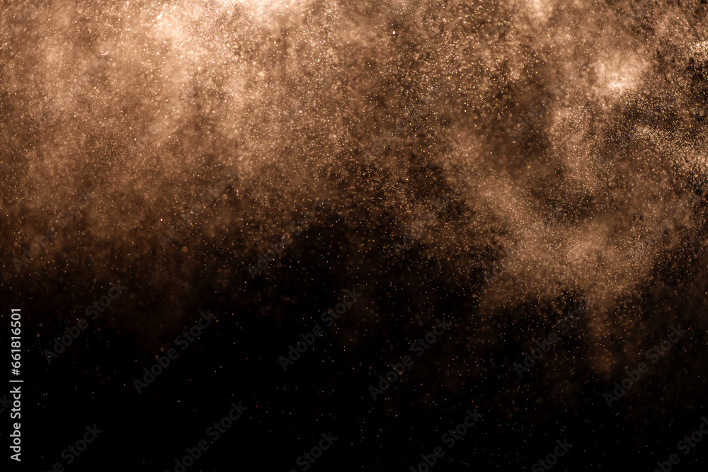 Obraz premium small drops of rain, snow on a black background. wind. Natural background. golden
