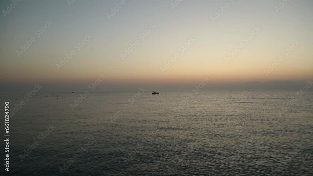 Small yacht at sea first rays of sun. Small yacht at sea first rays of sun.