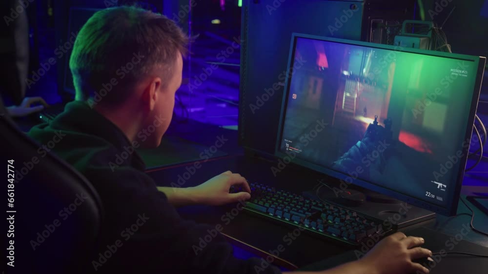 Player Victorious Against Terrorist Enemies In Modern Computer Game Digital Entertainment. Player Wins In Entertaining Shooter Video Game. Player Gaming On Pc For Entertainment. Military Simulator