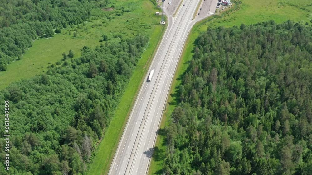 Aerial view of highway rest area with cafe and car park for cars and trucks Top view of highway infrastructure, 4k Aerial view of highway rest area with cafe and car park for cars and trucks Top view of highway infrastructure, 4k