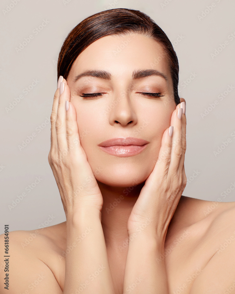 Rejuvenating facial spa treatment for middle aged woman's healthy skin. With copyspace. Rejuvenating facial spa treatment for middle aged woman's healthy skin. With copyspace.