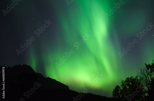 Northern lights on the sky behind the arctic circle in the north Norway during autumn © mecron