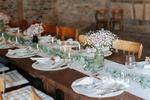 Beautiful table decoration at barn wedding