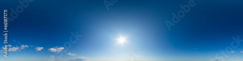 360 VR 2:1 equirectangular afternoon blue sky with few clouds background overlay. Ideal for 360 VR sky replacement. High quality 300 dpi, adobe rgb color profile