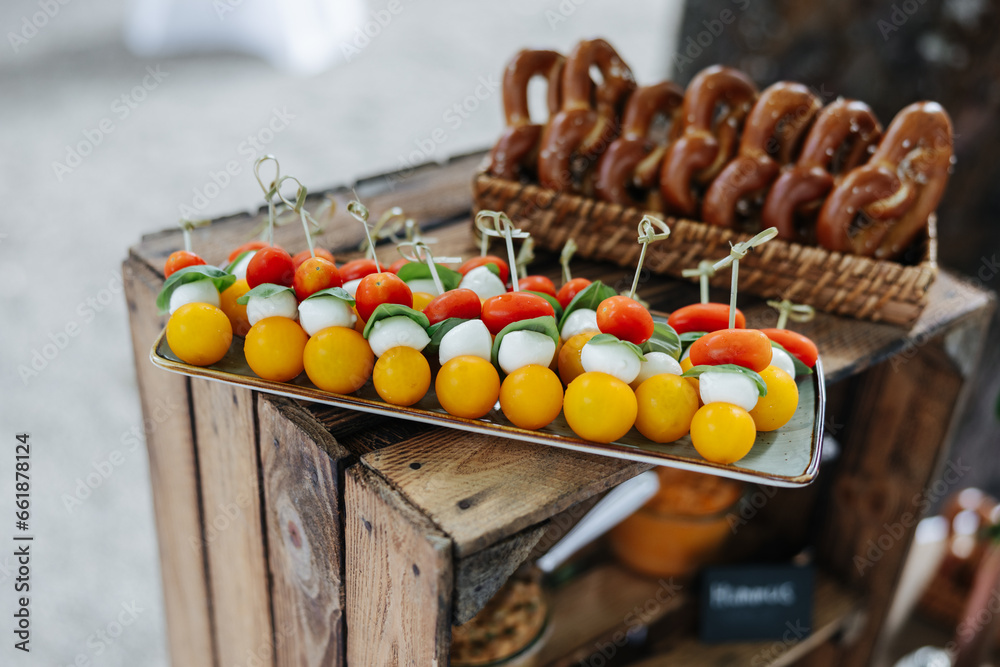 Tomatoes and mozzarella appetizers at a wedding reception