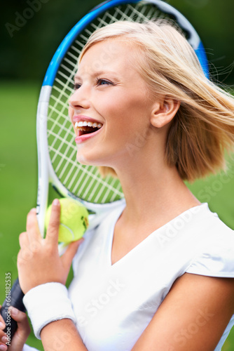 Smile, thinking or happy woman with a ball in tennis training match, fitness exercise or game outdoors. Racket, healthy person or excited girl athlete on court ready for sports, wellness or workout