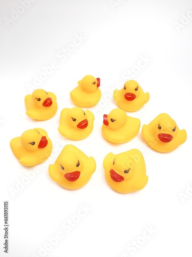 A yellow rubber duck toy isolated on a white background. Gathering rubber ducks © Junjunan Ramadhan
