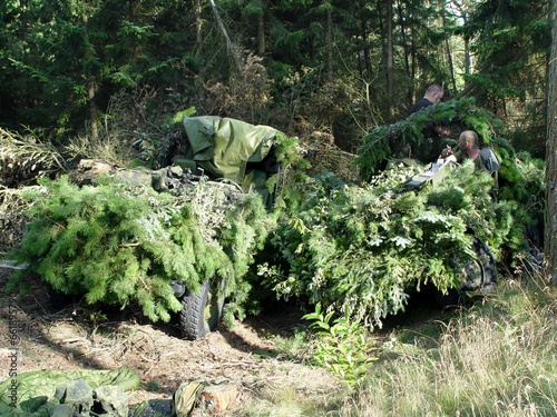 Tableau sur toile Forest, war and a military vehicle in camouflage for an attack or ambush during a special forces mission
