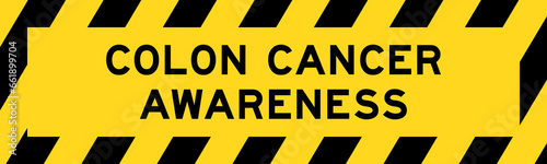 Yellow and black color with line striped label banner with word colon cancer awareness