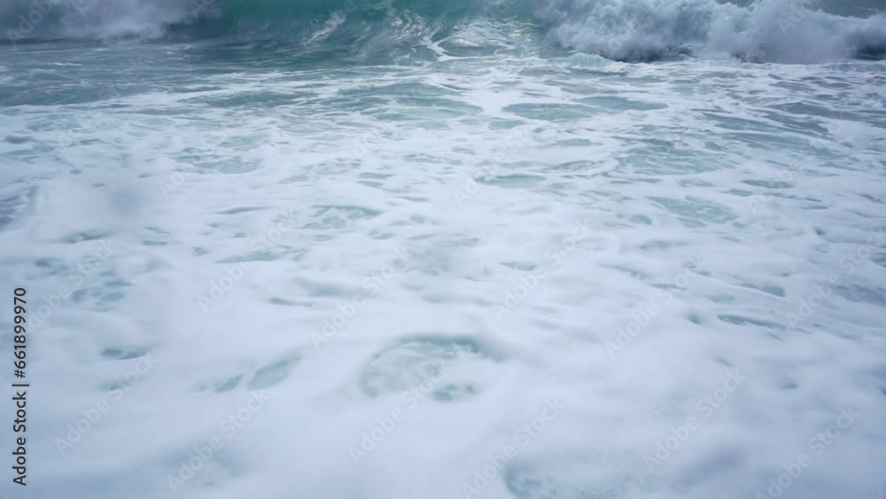 Sea waves wash the pebbly shore. Sea waves wash the pebbly shore.