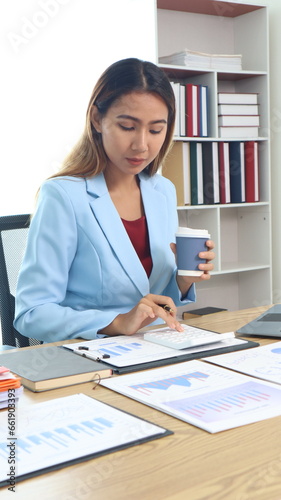 Thinking about how to take the business to technological heights. Cropped shot of an attractive young businesswoman working in her office.