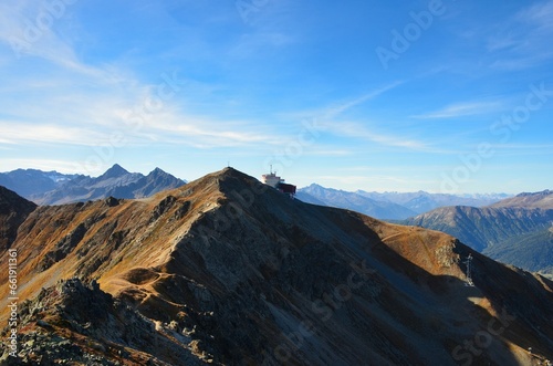 Jakobshorn. Beautiful autumn hike to the Jakobshorn above Davos Klosters Mountains. Mountaineering in the Swiss Alps Grison. High quality photo © SimonMichael