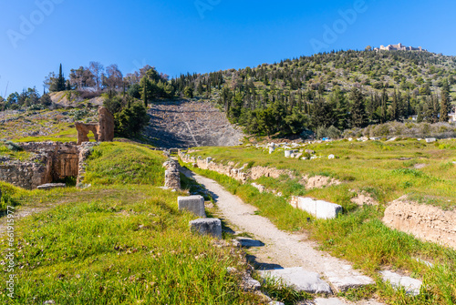 Argos, Greece - 19 February 2023 - The old ruins of the ancient theater of Argos. Old archeological site photo