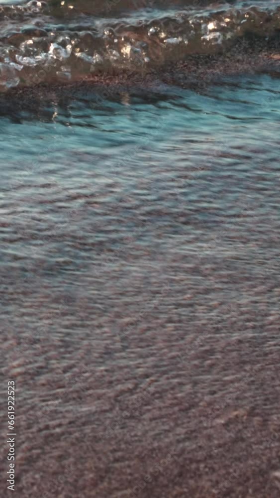 Close-up of calm, clear waves at the beach Close-up of calm, clear waves at the beach