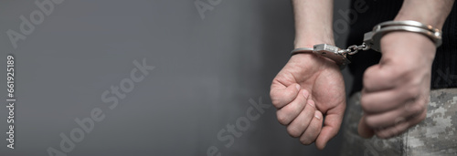 man hand handcuffs in back