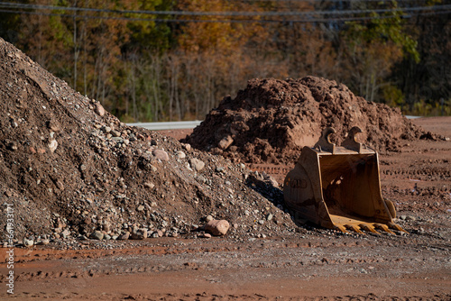 Excavator bucket on the ground