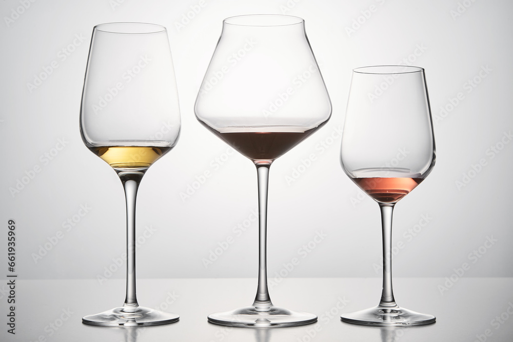 Red, white, pink wines assortment in glassware.