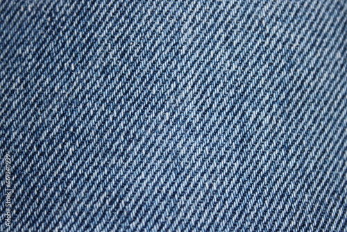 Up close picture of blue jeans fabric pattern