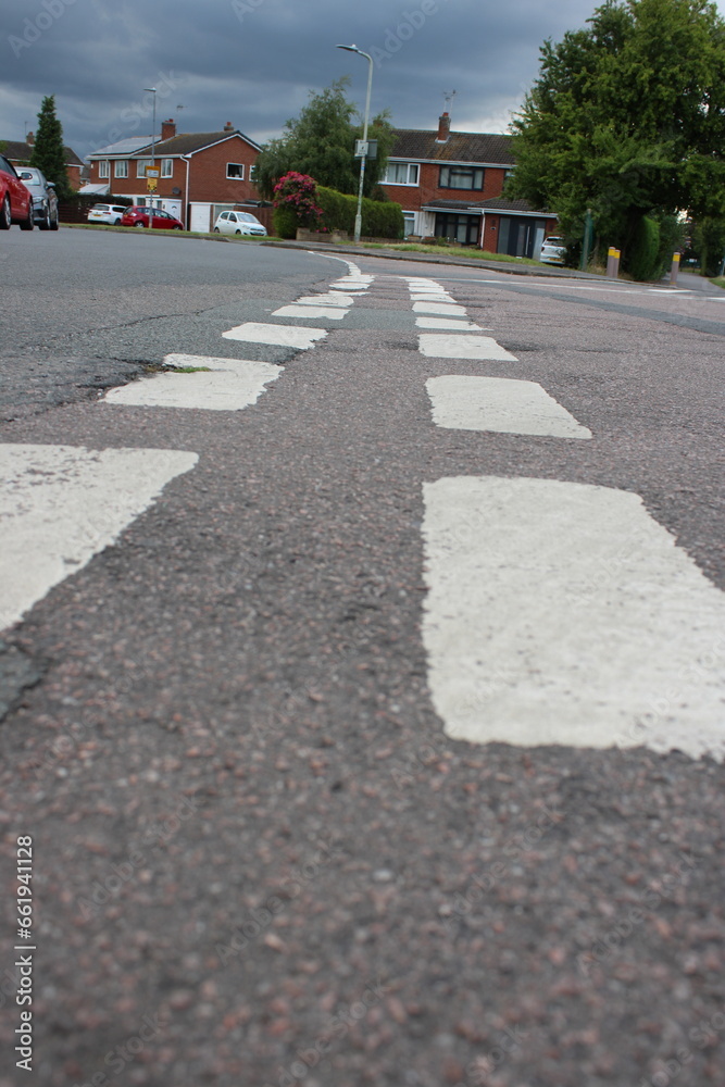 Close up of give way markings on a residential road UK