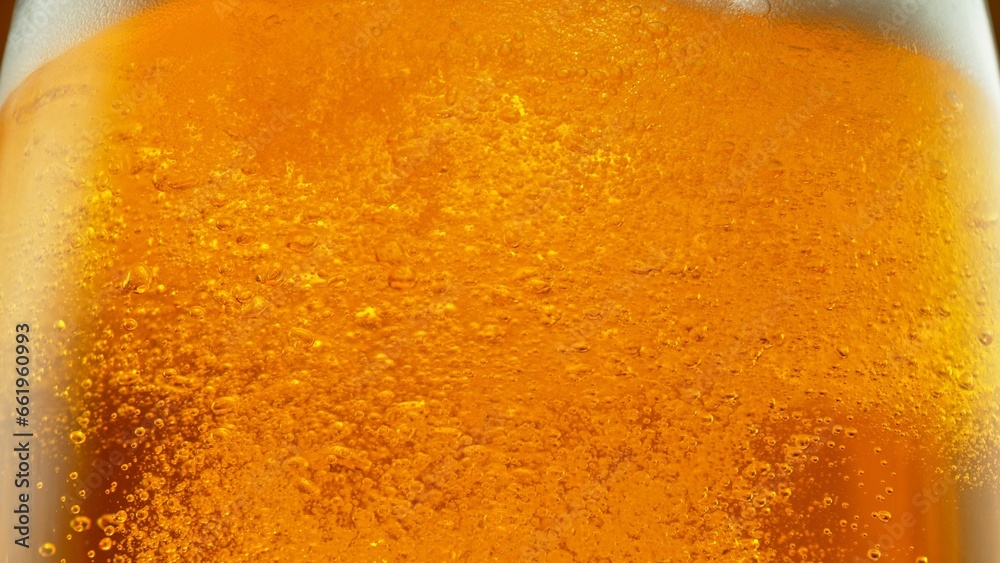 Detail of Pouring Beer Into Glass, Close-up. Detail of Pouring Beer Into Glass, Close-up.