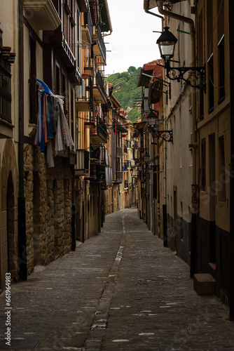 Narrow street in Getaira old town on a cloudy day  Gipuzkoa  Basque Country  Spain  Europe