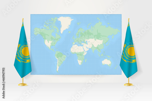 World Map between two hanging flags of Kazakhstan flag stand.