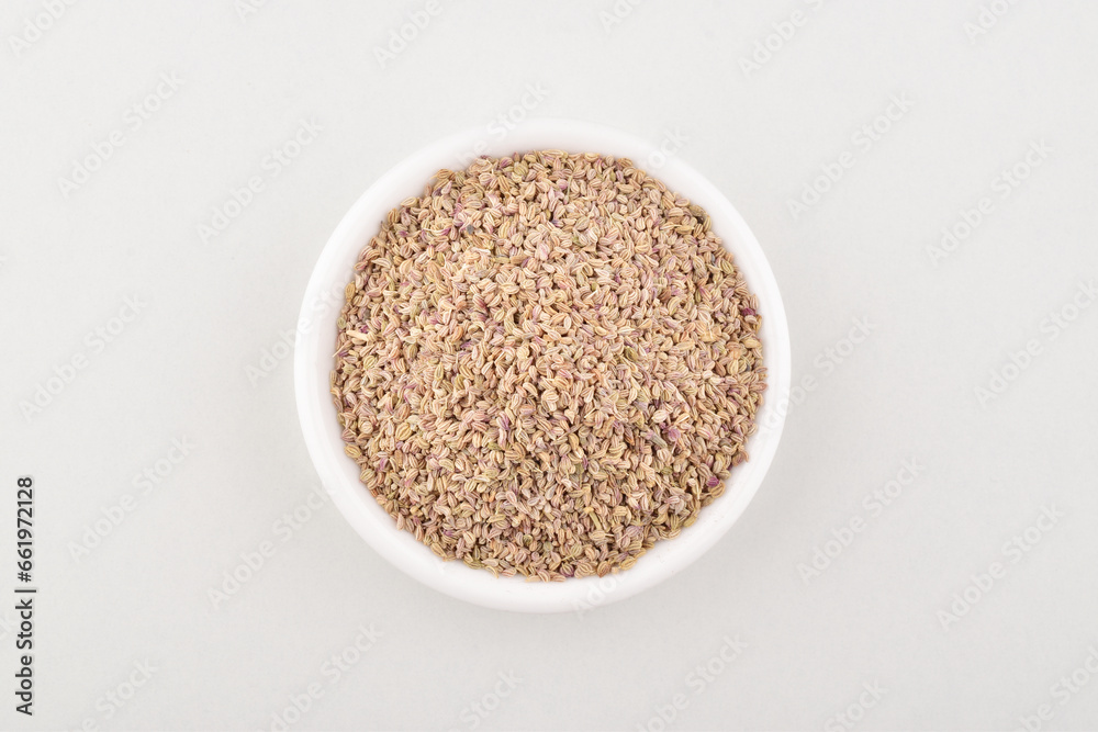 Top view of carom seeds on white background Top view of carom seeds on white background
