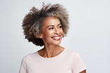 A cheerful and happy African American woman, exuding confidence and charm in her portrait, with a modern and carefree lifestyle.
